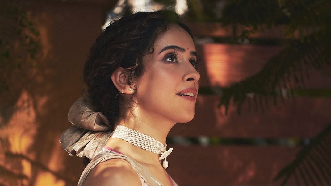 Sanya Malhotra paired a candy pink linen zari sari by Eka with a hand-sculpted porcelain choker