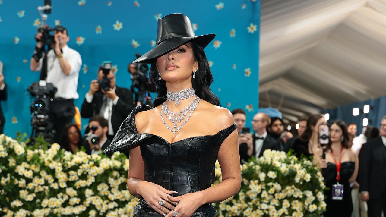 Kim Kardashian wears a croc leather chrome hearts set to the 2025 Met Gala