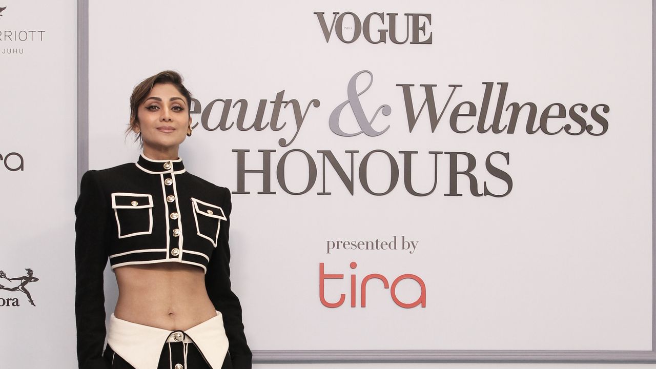 Shilpa Shetty wore a daringly low-cut midriff-baring set by Helen Anthony