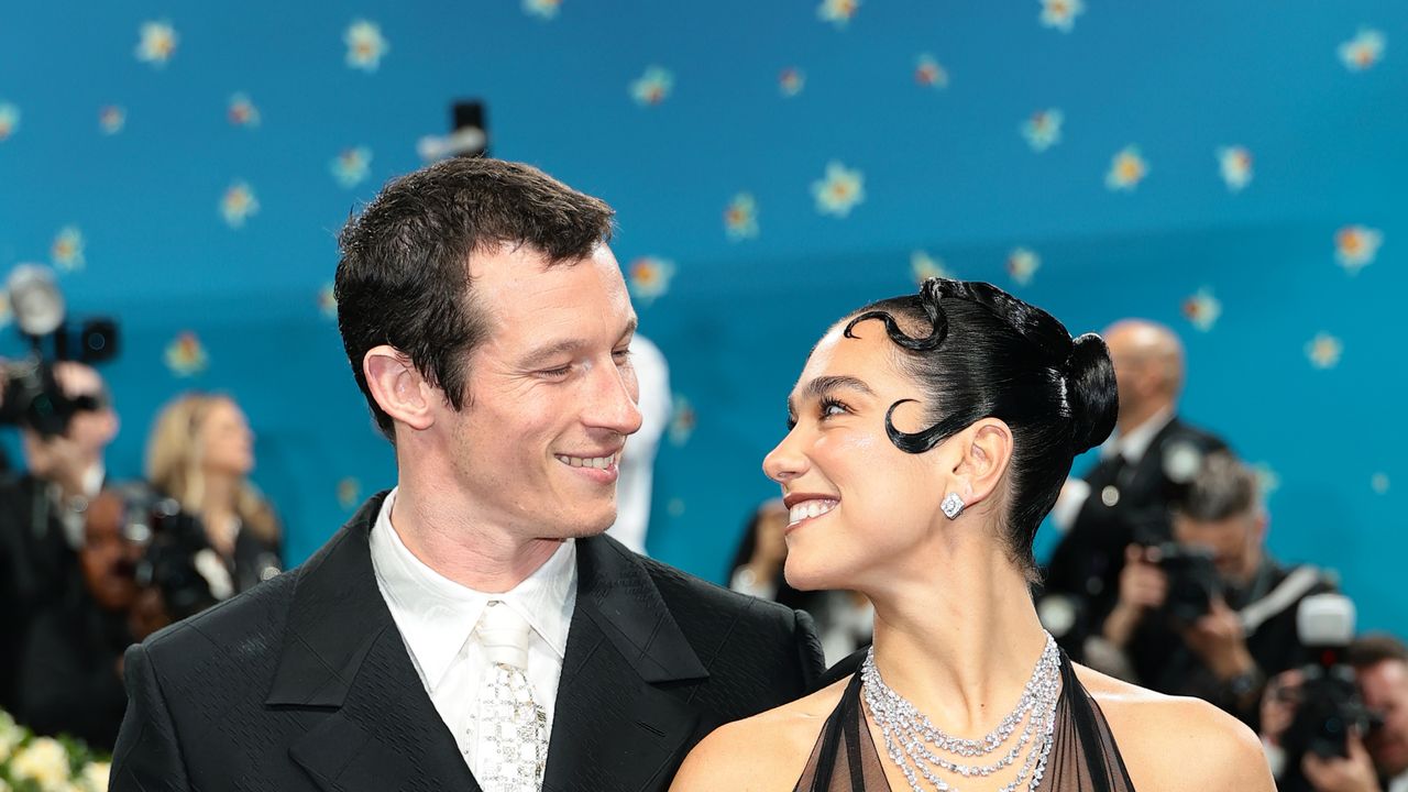 Dua Lipa’s Chanel look for the 2025 Met Gala was adorned with feathers, crystals… and Callum Turner