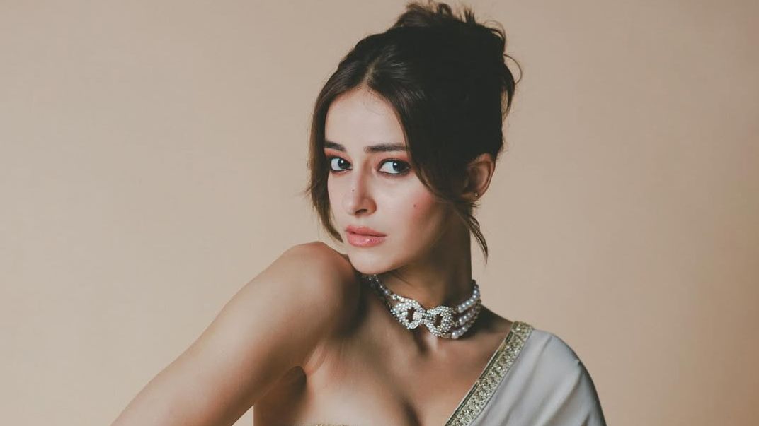 Ananya Panday paired an ivory Masaba sari with a glittering blouse