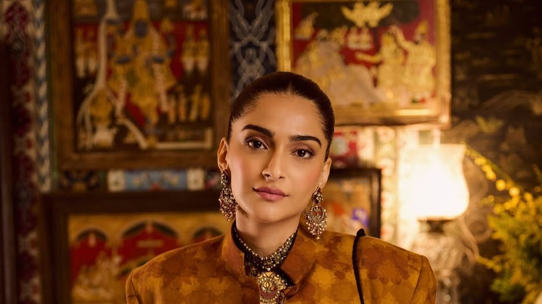 Sonam Kapoor paired a custom Siddhartha Bansal ensemble with a silver elephant purse